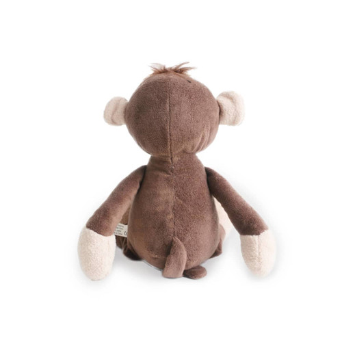 A brown plush monkey toy with light-coloured hands and ears, featuring a small tuft of fur on its head.