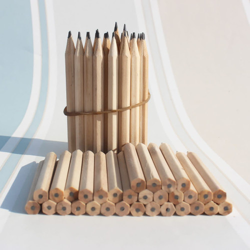 A bundle of grey-lead pencils without erasers, featuring natural wooden finish and hexagonal shapes.