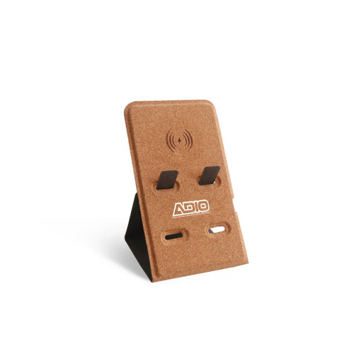 A cork-finished wireless charger with a stand, featuring two slots and a logo at the base.