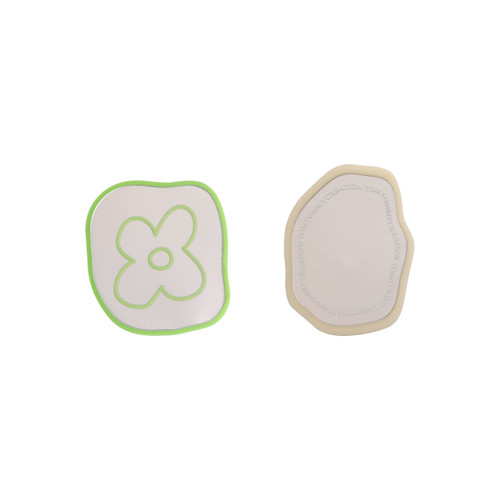 A custom-shaped mirror phone pop holder in cream with green outline, featuring two different designs.