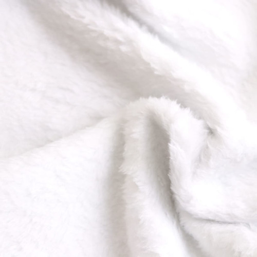 A soft, fluffy white flannel blanket with a luxurious texture. Features a subtle sheen.