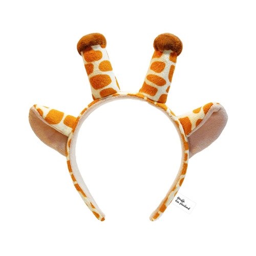 A giraffe-themed ear hairband in orange and white, featuring giraffe ears and horns. It has a small logo tag.
