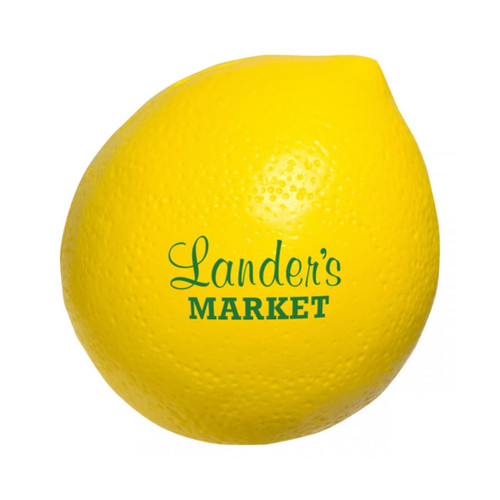A yellow lemon-shaped stress reliever featuring a logo. The textured surface mimics a real lemon.