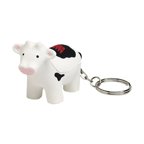A cow-shaped stress reliever in white and black, attached to a metal keyring.