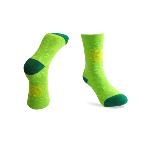 Bright green football socks with towel bottoms, featuring a patterned design and a logo.