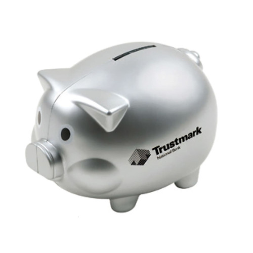 A silver pig-shaped coin bank with a slot for coins and a logo on the side.