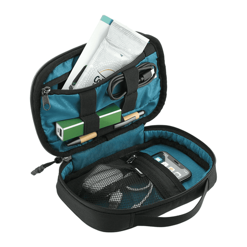 A black and teal toiletry bag with various items including a charger, pen, and toiletries neatly organised inside.