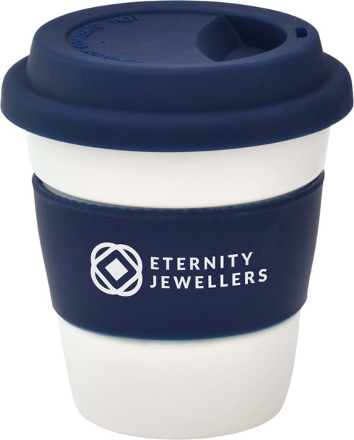 A reusable coffee cup in white and navy blue, featuring a silicone lid and a branding logo.