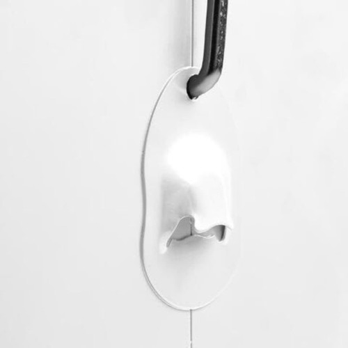 A sleek white metal cooler box featuring a bottle opener on the side.