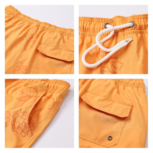 Men's swim shorts in bright orange, featuring a drawstring waistband and side pockets with an overall floral pattern.