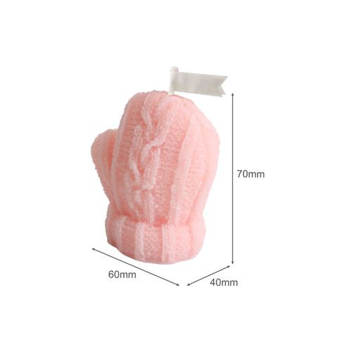 A pink glove-shaped candle featuring a textured design and a small flag on top, measuring 70mm tall.