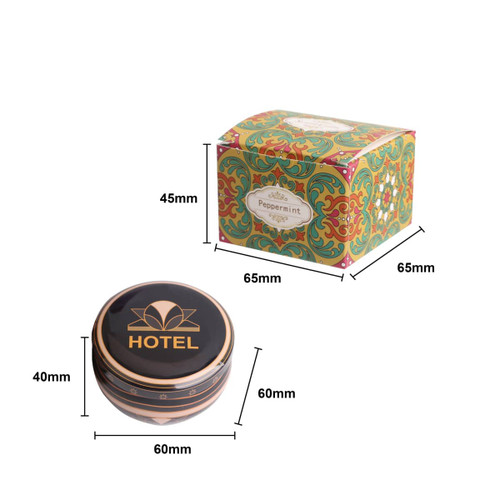 A peppermint tin candle in a colourful box featuring a logo, measuring 60mm in diameter and 40mm in height.