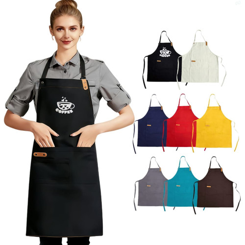 A woman wearing a black poly-cotton canvas bib apron, with various coloured aprons displayed behind her.
