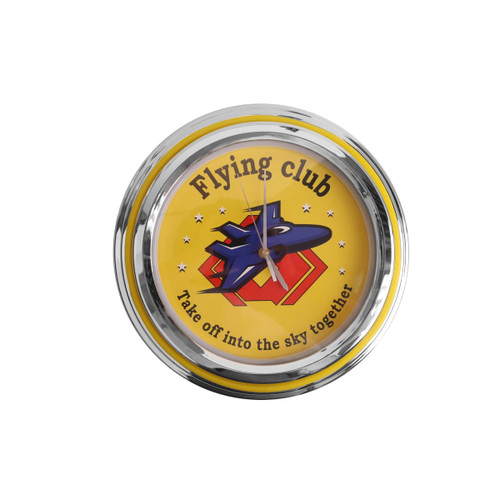 A round neon wall clock with a yellow background, featuring a graphic of an aircraft and a chrome frame.