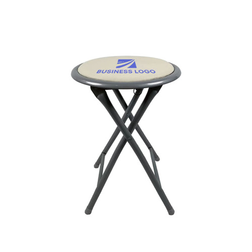 A folding stool with a beige top and grey legs, featuring a logo on the seat.