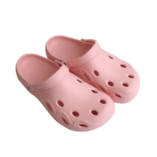 A pair of pink Clog Slides featuring ventilation holes and a back strap. The product has a branding logo.