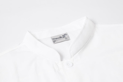 A white chef jacket with short sleeves and a single-breasted design, featuring a collar and a logo on the label.