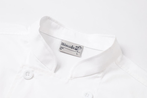 A white double-breasted chef jacket with short sleeves and a branded label near the collar.