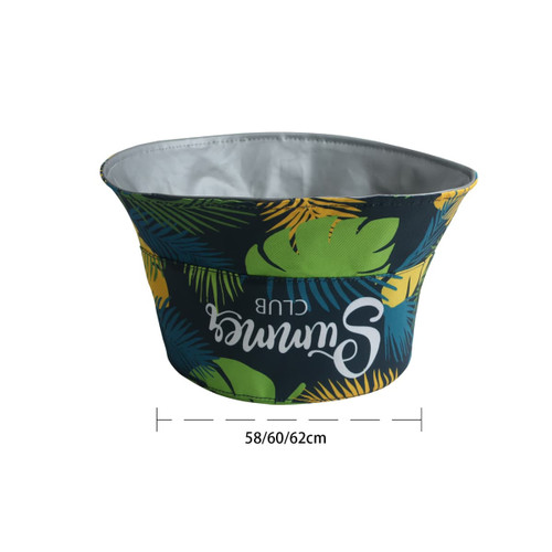 A vibrant green and yellow ice bucket hat with tropical leaf patterns, featuring a logo. Dimensions are 58/60/62 cm.
