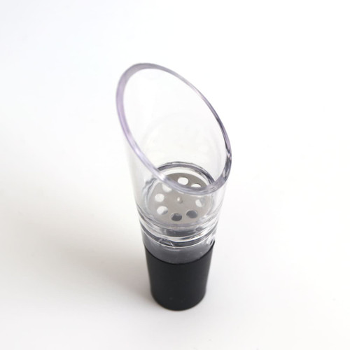 A wine aerator in clear plastic with a black base, featuring a perforated insert for aeration.