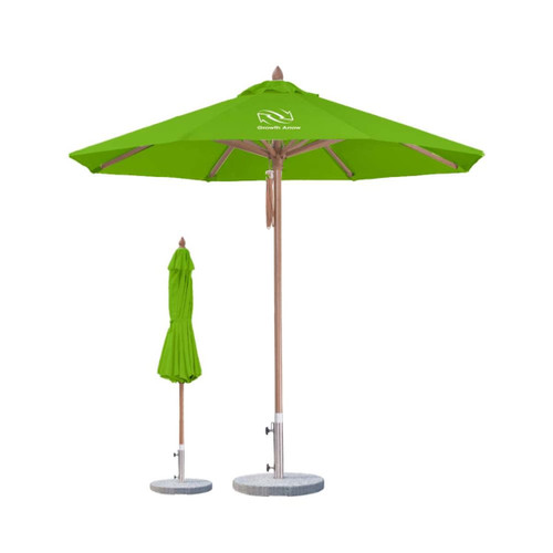 A green, 4x4m wind-resistant octagon outdoor umbrella with a wooden pole and a base, alongside a folded umbrella.