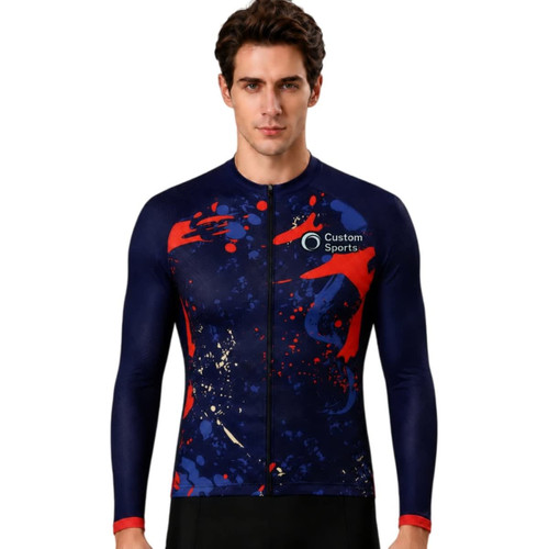 A men's long sleeve cycling jersey with a navy background, featuring red and abstract splatter designs, and a logo.