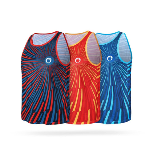 A set of three singlets in blue, red, and a combination of red and blue, featuring a vibrant, radial design.