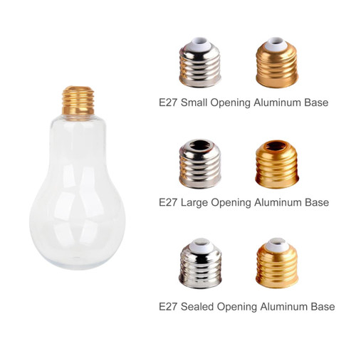 A drink bottle shaped like a light bulb, made of clear plastic, with a gold-coloured metal cap.