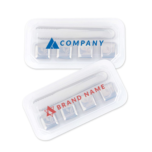 A transparent container holds four stainless steel ice cubes and a metal tongs. The cubes are silver and have a logo.