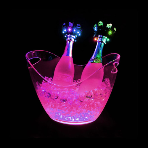 A clear LED ice bucket with a pink glow, holding two bottles surrounded by ice. It features a crown-shaped design on top.