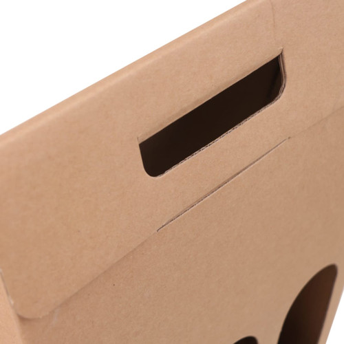 A cardboard wine box featuring three circular cutouts and a handle, in a brown colour, with a simple logo.
