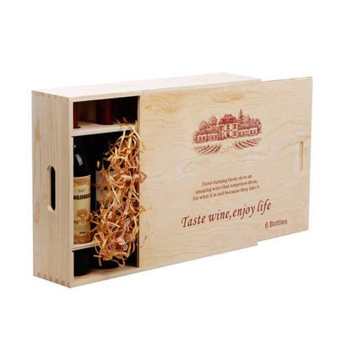 A wooden gift box in natural finish holds six wine bottles, featuring wood shavings and a logo on the front.