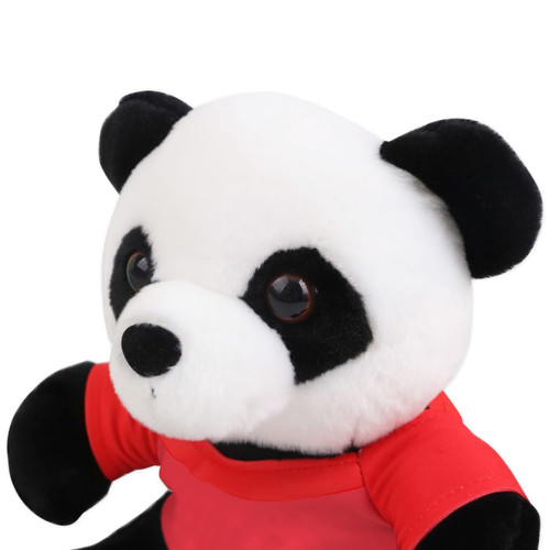 A plush toy panda with black ears and eyes, wearing a red shirt. The toy features a soft, cuddly texture.