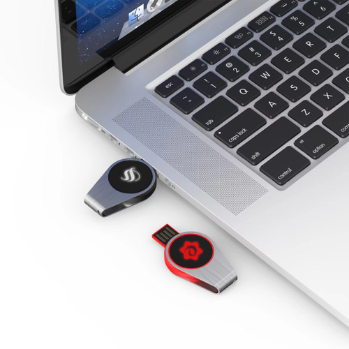 A swivel lighting logo flash drive in black and red connected to a laptop. It features a sleek metallic design.