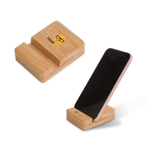 A bamboo phone holder in natural tones, featuring a logo, designed to support smartphones in an upright position.