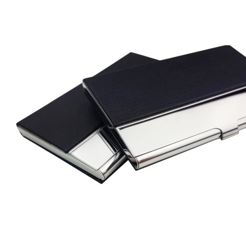A PU leather business card holder in black with a silver metal accent, featuring a logo on the surface.