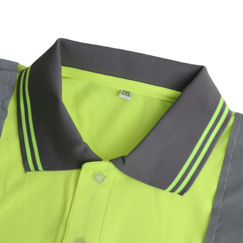 A close-up of a unisex hi-vis reflective polo shirt in bright yellow and grey, featuring a collar with striped detailing.
