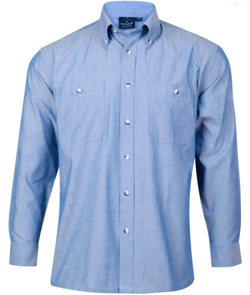 A long sleeve button-up shirt in light blue chambray, featuring two chest pockets and a logo on the collar.