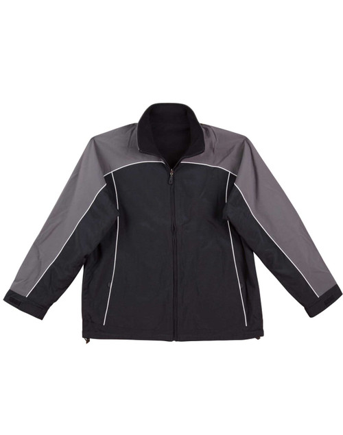 A reversible jacket in black and grey with contrasting design elements and a logo on the left side.