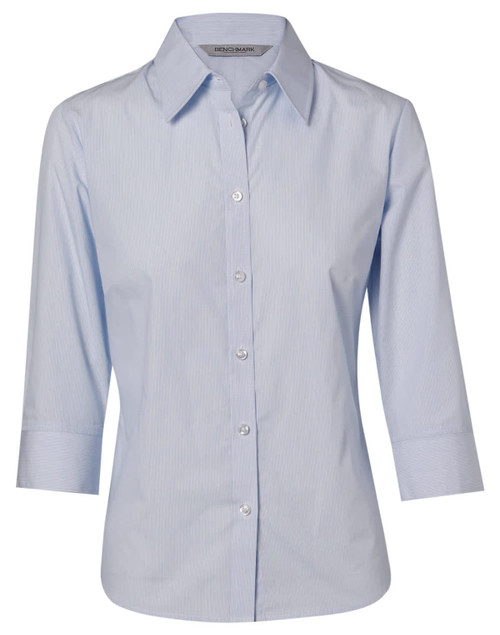 A light blue women's button-up shirt with fine stripes and 3/4 sleeves, featuring a collar and a logo.