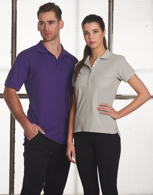 A purple men's polo shirt and a grey women's polo shirt displayed on models. Both styles feature a logo.