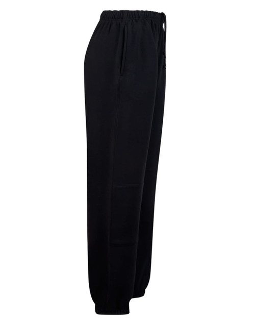 Black fleecy track pants featuring zip cuffs and knee padding, designed for kids, with an elastic waistband.