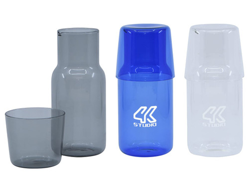 A drink bottle set featuring a clear carafe, a blue tumbler, and a grey tumbler, with a logo present.