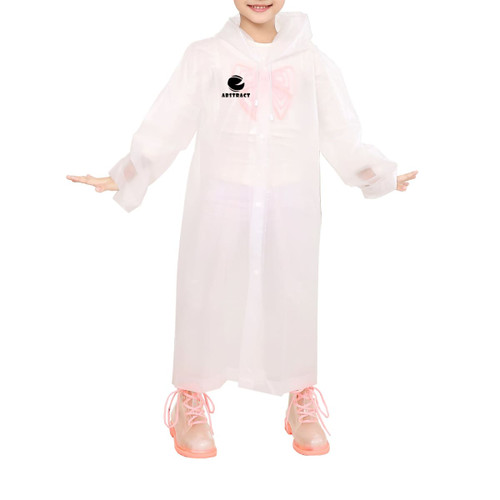 A child wearing a white EVA reusable raincoat, featuring a logo, with pink shoes and a cheerful pose.