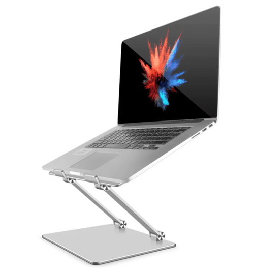 A silver laptop stand with adjustable arms holding a laptop, positioned on a flat base.