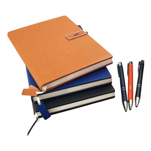 An orange notebook with a textured cover, stacked with blue and black notebooks, alongside four pens in various colours.
