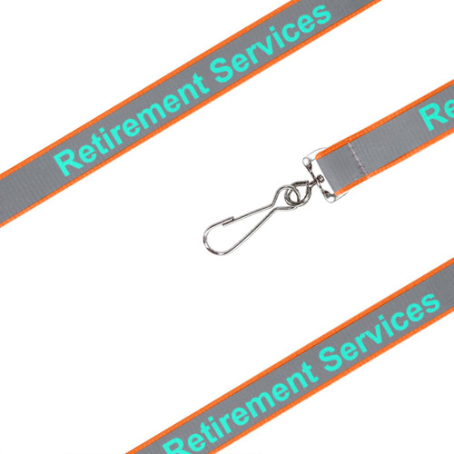 A grey lanyard with orange accents and a clip, featuring a logo and text for "Retirement Services."