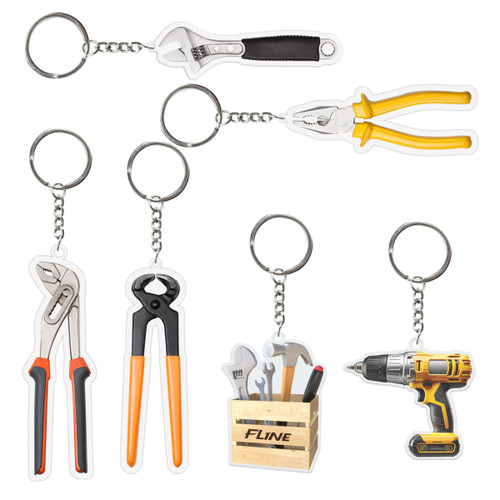 A collection of custom shape acrylic keyrings featuring tools like a wrench, pliers, and a drill, in various colours.