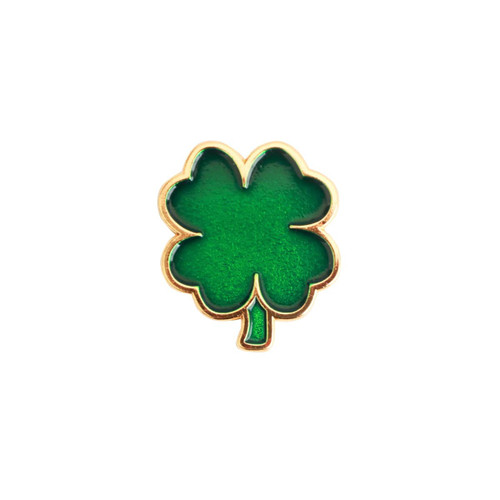A green soft enamel golf ball marker shaped like a four-leaf clover with a gold outline.