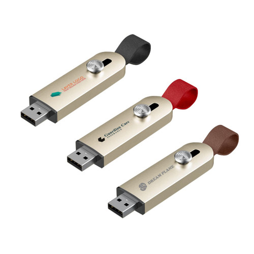 A sliding metal flash drive in gold with black, red, and brown straps, featuring various logos on each.
